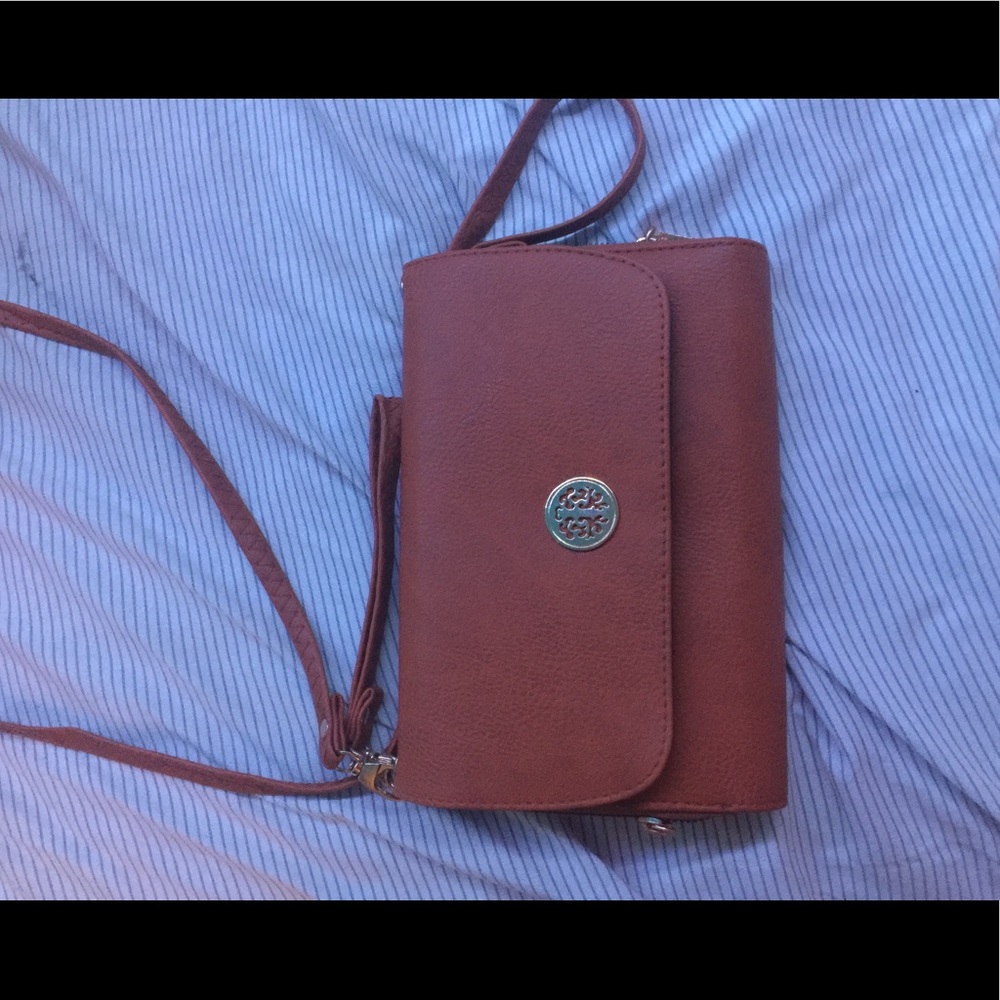 brown crossover purse or wristlet